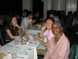 Director Jacqueline DjeDje with students at La Fonda Restaurant